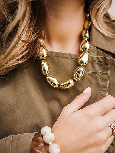 Gros collier doré femme