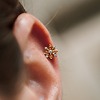Piercing fleur​