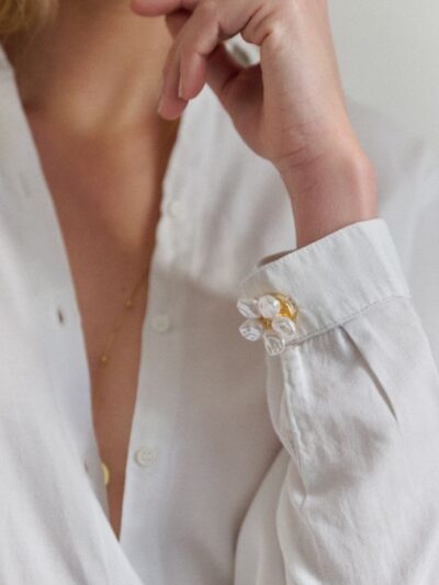 Cache bouton chemise femme