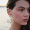 Boucle d'oreille marguerite pendante